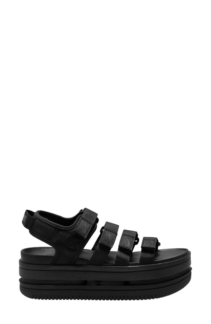 Sporty straps and a lofty, layered platform distinguish an iconic sandal finished with signature Nike comfort, traction and durability. 2 1/2" heel; 2" platform (size 11) Textile upper and lining/synthetic sole Imported Nordstrom x Nike: A curated lifestyle destination where fashion is the ultimate sport Nike Platform Sandals, Black Platform Slide Footbed Sandals, 90’s Platform Sandals, Platform T-strap Synthetic Sandals, Black Platform Slip-on Footbed Sandals, Chiffon Top, Sandal Women, Top Designers, Platform Sandals