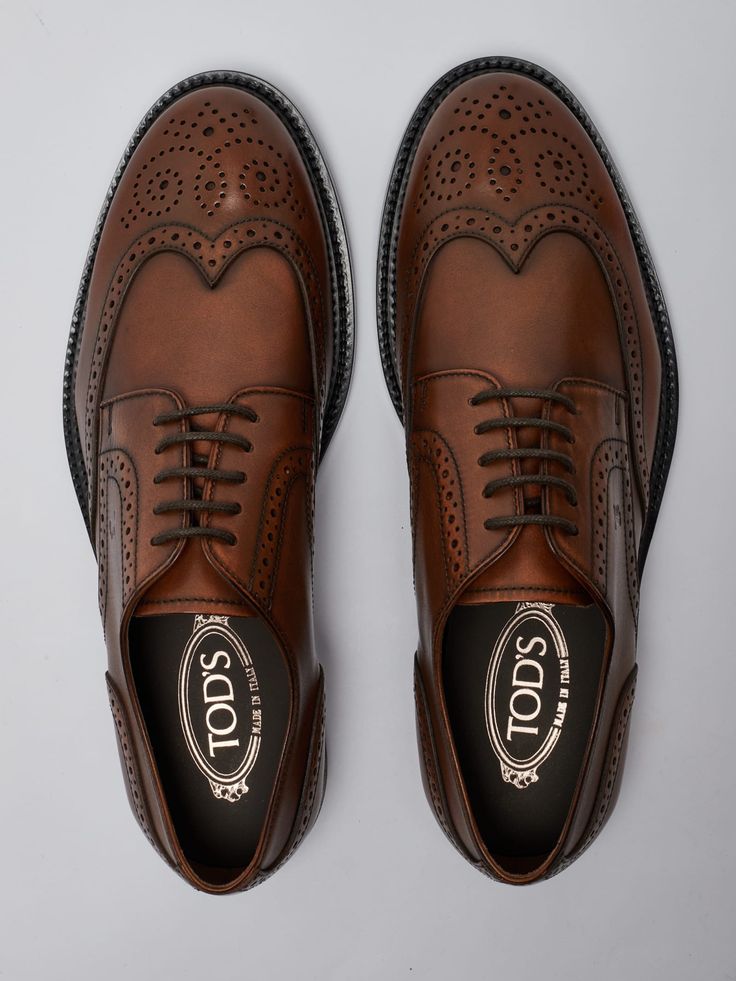 Upper: 100% Calf leather Sole: 100% Rubber Luxury Patent Leather Lace-up Shoes With Brogue Detailing, Calf Leather Cap Toe Oxfords With Branded Insole, Timeless Brown Lace-up Shoes With Rubber Sole, Luxury Oxfords With Brogue Detailing And Round Toe, Classic Lace-up Shoes With Calf Leather And Round Toe, Luxury Wingtip Lace-up Shoes For Galas, Designer Wingtip Dress Shoes For Work, Designer Semi-formal Oxfords With Leather Sole, Designer Calf Leather Lace-up Derby Shoes