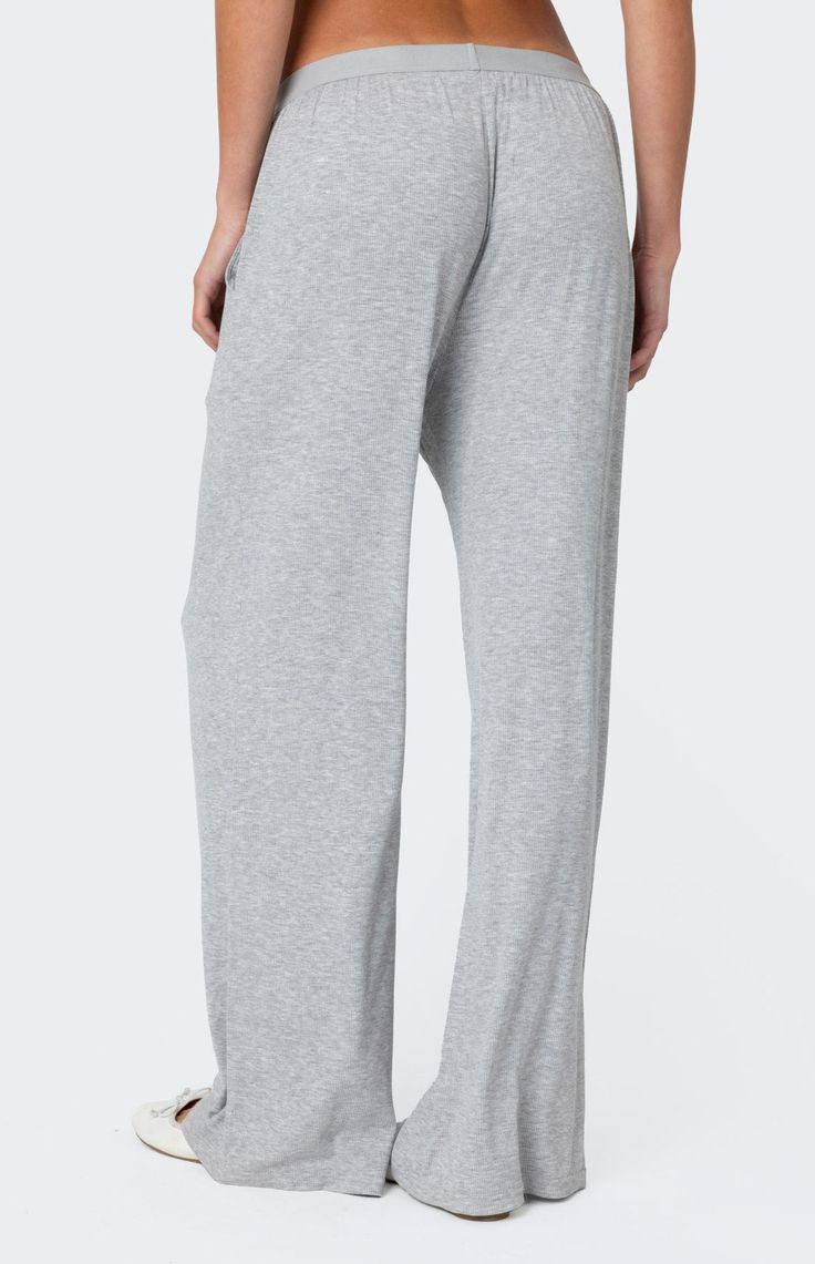 Online only! Level up your look with the Heather Lounge Pants from Edikted, crafted for ultimate comfort and style. These loungewear pants feature button detailing for added charm and versatility. Perfect for relaxing at home or running errands in casual chic, they're a must-have addition to your wardrobe.


	Loungewear pants
	Button detailing
	Cotton, Polyester, Spandex
	Model wears size S
	Model height is 5'9
	Item care: Wash with similar color Wide Leg Straight Pants With Comfort Waistband For Loungewear, Wide Leg Pants With Comfort Waistband For Loungewear, Comfortable Straight Leg Loungewear Bottoms, Comfortable Loungewear Pants With Ribbed Waistband, Comfy Bottoms With Comfort Waistband, Comfy Long Lounge Pants, Comfy Long Pants For Lounging, Comfortable Pants With Ribbed Waistband For Loungewear, Comfy Bottoms With Comfort Waistband For Relaxation