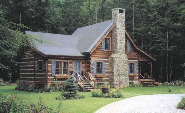 a log cabin sits in the middle of a wooded area