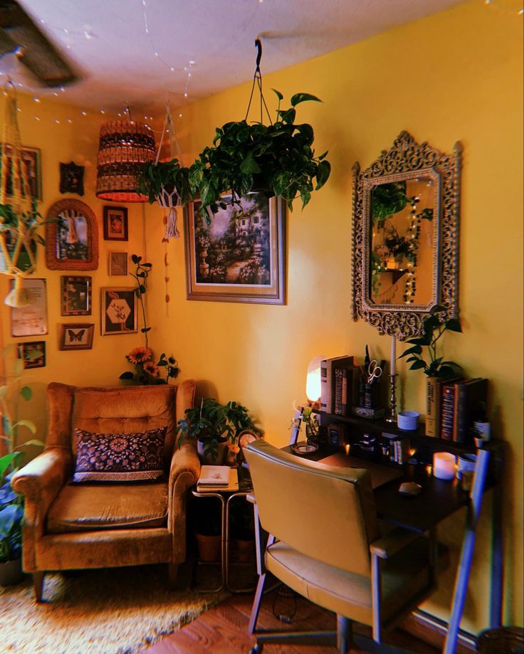 a living room filled with furniture and lots of pictures on the wall above it's desk