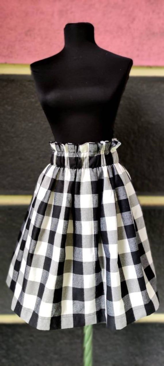 New designer skirt from our shop. It's made from beautiful soft plaid fabric. With elastic on the waist so fits all sizes. Length - 70 cm Chic Pleated Plaid Skirt, Summer Plaid Pleated Skirt, Summer Plaid Mini Pleated Skirt, Plaid Pleated Mini Skirt For Spring, Plaid Cotton Lined Skirt Bottoms, Chic Plaid Pleated Skirt, Casual Plaid Pleated Skirt For Summer, Plaid Cotton Skirted Bottoms, Plaid Cotton Relaxed Skirt