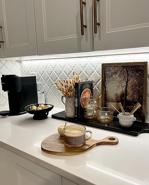 the kitchen counter is clean and ready to be used for breakfast or desserts, as well as other items