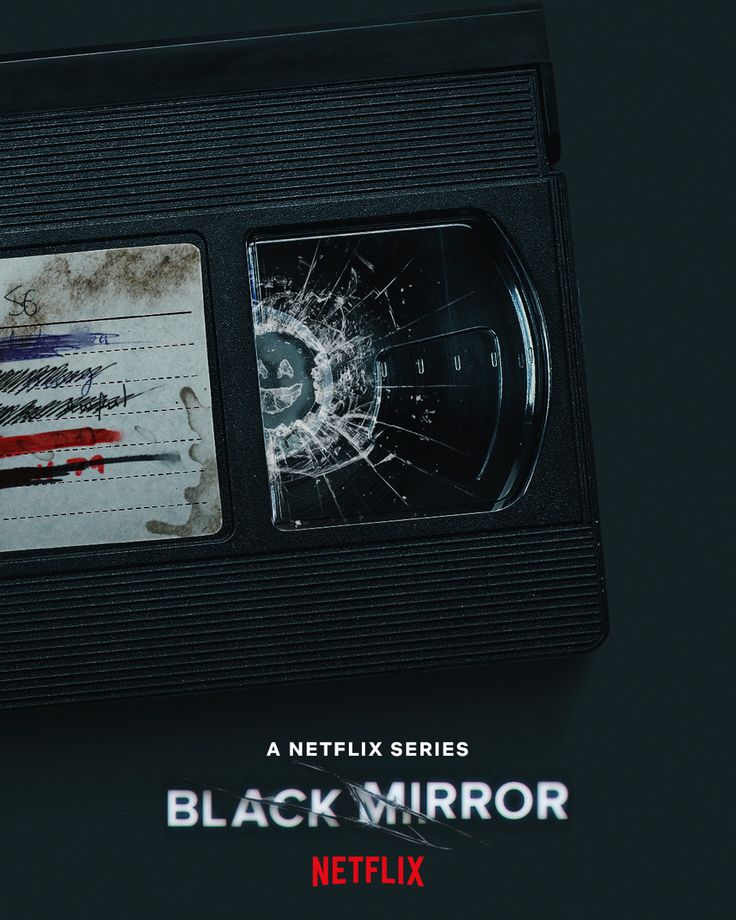 the black mirror season 2 poster with an old vhs tape and broken glass on it