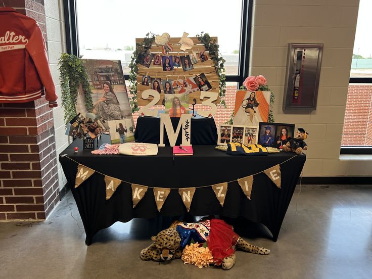 a table with pictures and decorations on it