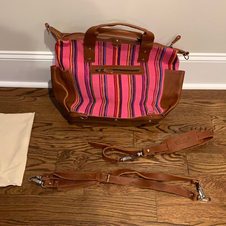 Brand New Nena & Co “Perfect Bag”. Bold Bright Fabric With Full Grain Leather Pockets, Handles & Removable Shoulder & Cross Body Straps. Measures 14” X 17” X 6”. Handle Drop 8”. Shoulder Strap 17-26”. Cross Body Strap 36-46”. 100% Cotton Interior. Comes With Genuine Nena & Co Storage Bag. Everyday Pink Bag With Top Carry Handle, Everyday Pink Bags With Top Carry Handle, Pink Satchel With Top Carry Handle For Everyday Use, Rectangular Diaper Bag With Adjustable Strap For Errands, Pink Tote Satchel With Detachable Strap, Pink Bags With Detachable Strap For On-the-go, Pink Everyday Bag With Detachable Strap, Weekender Satchel Bag With Adjustable Strap, Pink Everyday Crossbody Satchel