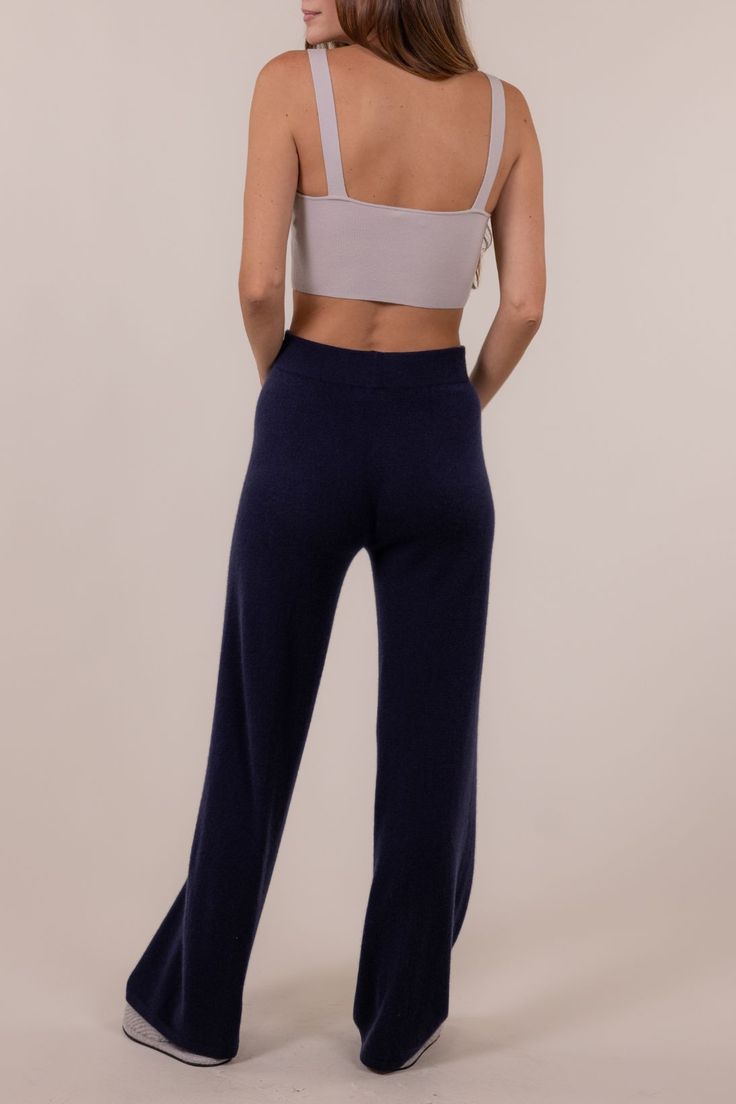 HC07F23 - 100% Cashmere- Full length- Straight leg- Elasticized waistband- Measurements on model:- Length below waistband - 38 1/2"- Waist - 15" flat- Bottom width - 10 1/2"- Model is 5'9" and wearing a size Small Blue Stretch Bottoms With Waistband, Navy Straight Leg Loungewear Bottoms, Mid-rise Pants With Contoured Waistband, High Waist Bottoms With Contoured Waistband For Loungewear, Navy Wide Leg Loungewear Bottoms, Navy Wide Leg Bottoms For Loungewear, Elegant Blue Pants For Loungewear, Blue Fitted Bottoms With Contoured Waistband, Fitted Blue Bottoms With Contoured Waistband