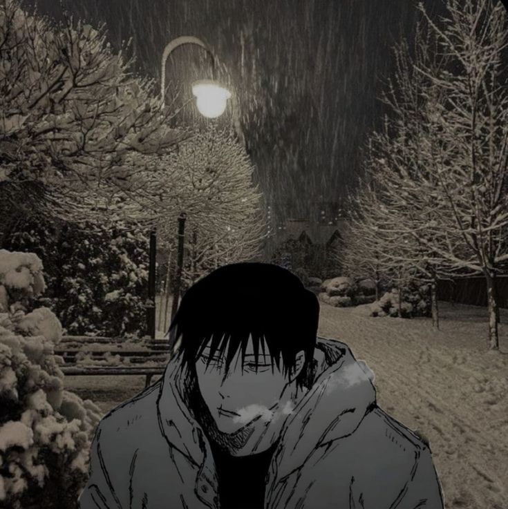 a man standing in the snow at night with his head down and eyes closed,