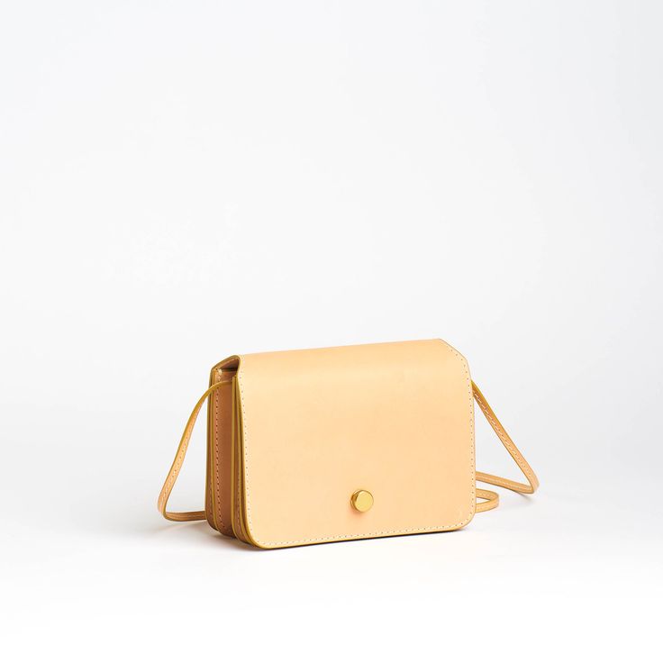 Chic Rectangular Case Bag With Card Slots, Chic Bags With Card Slots, Modern Clutch Bag With Card Slots, Modern Travel Shoulder Bag With Card Slots, Modern Crossbody Shoulder Bag With Card Slots, Modern Leather Flap Bag With Smooth Grain, Modern Office Bags With Card Slots, Modern Office Bag With Card Slots, Modern Leather Flap Bag