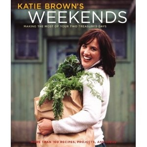 a woman holding a large bag full of green vegetables on the cover of a magazine