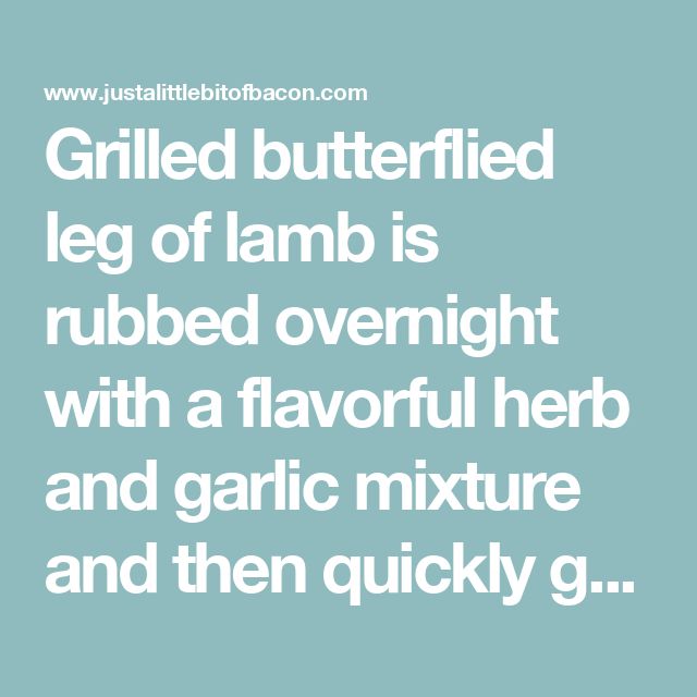 the words grilled butterflied leg of lamp is rubber overnight with a flavored herb and garlic mixture and then quickly g