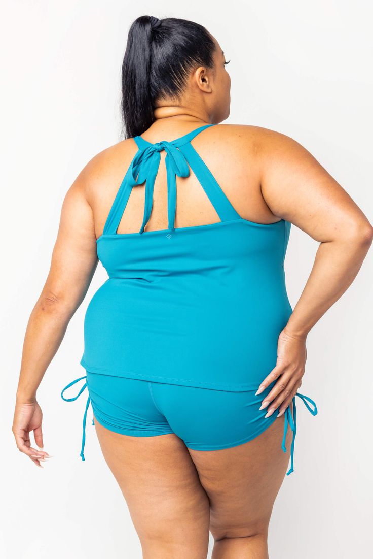 Introducing our Tankini Swim Top, the most requested swim style by our community! Featuring a sweetheart neckline, adjustable straps, and a sexy keyhole cutout to show the perfect amount of skin with full tummy coverage. The sweep of the garment is long and flowy for extra confidence. The bust is double-lined for extra coverage and support. The cinch pull string matches perfectly with our Swim Booty Shorts. Or pair it with our 9 inch swim shorts for more coverage. This is the plus size tankini y Plus Size Workout Clothes, The Cinch, Swim Style, Swim Gifts, Plus Size Tankini, Plus Size Workout, Plus Size Swim, Tankini Swim Tops, Swim Tankini