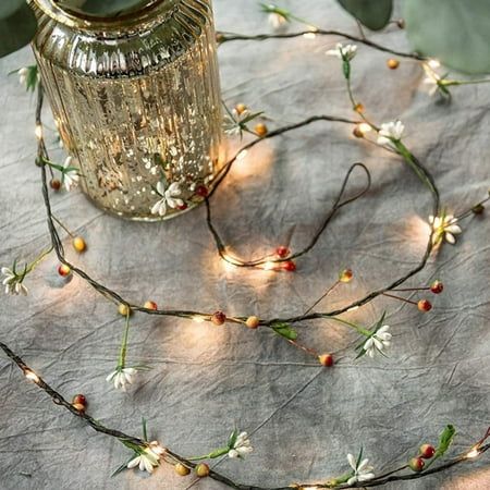 a glass jar with some lights on it