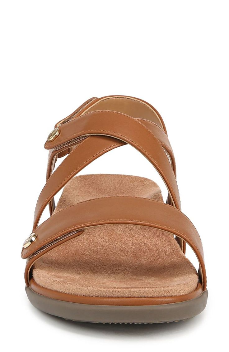 Adjustable straps offer a customized fit in a sleek leather sandal grounded by a contoured footbed and subtle wedge heel. 1 1/2" heel; 3/4" platform Adjustable straps with hook-and-loop closures Contoured footbed with arch support Leather upper/synthetic lining/rubber sole Imported Leather Working Group certified This product meets Nordstrom Responsible Sourcing and Manufacturing criteria: made with practices that meet higher environmental or social standards Synthetic Double Strap Wedge Sandals With Heel Strap, Strappy Synthetic Wedge Sandals With Heel Loop, Adjustable Slingback Synthetic Footbed Sandals, Synthetic Double Strap Wedge Sandals, Adjustable Synthetic Slingback Footbed Sandals, Synthetic Double Strap Wedge Sandals With Heel Loop, Slingback Sandals With Removable Insole, Medium Width, Medium Width Slingback Sandals With Removable Insole, Strappy Synthetic Wedge Sandals With Arch Support