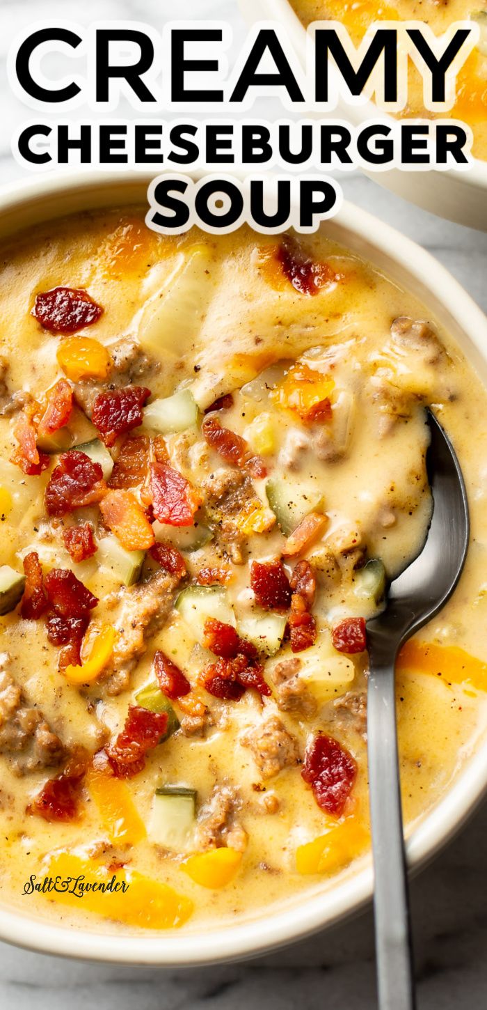 creamy cheeseburger soup in a white bowl with a spoon on the side and text overlay that reads, creamy cheeseburger soup