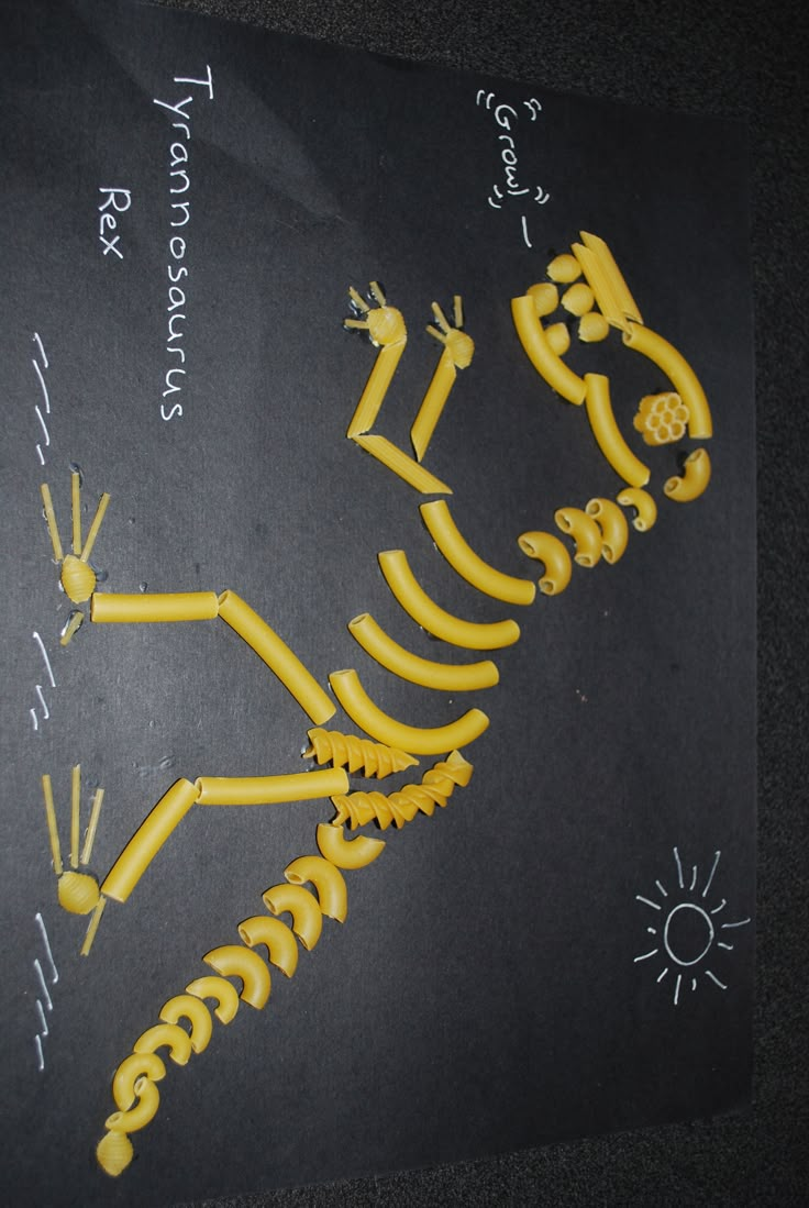 the skeleton is made out of yellow plastic and has writing on it that says,