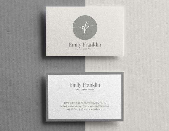 two business cards on top of each other with the letter f in grey and white