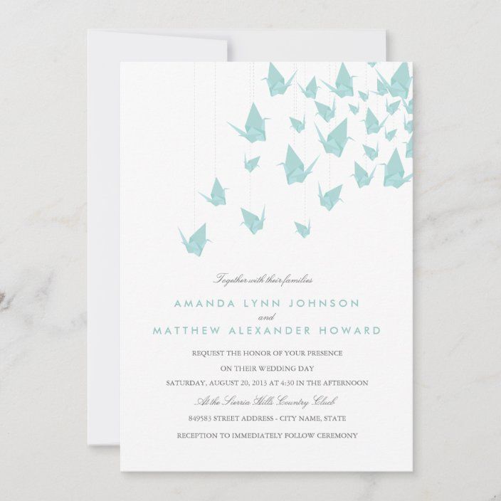 a wedding card with origami birds hanging from it's strings and the words,