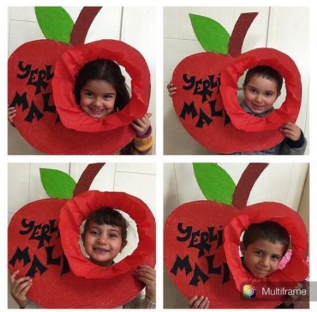 four pictures of a young boy holding a heart shaped pillow