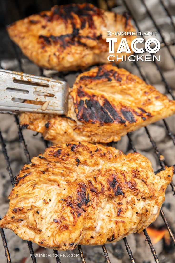 two pieces of meat cooking on top of an open grill with the words, 3 ingredient taco chicken