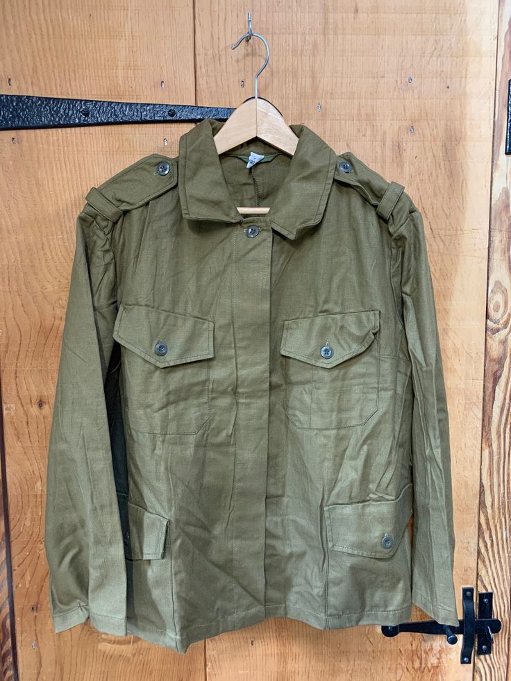 Herring bone twill (HBT)light field jacket  Even has a spare materiel swatch and button in the pocket  more brown khaki then green Has had a badge removed from the army but no signs of use  Fastens right to left with buttons 23" across the chest  27" back length  16" inner arm The Army, Field Jacket, Favorite Outfit, Gender Neutral, Bathing Beauties, Jackets & Coats, Adult Outfits, Music Clothes, Green