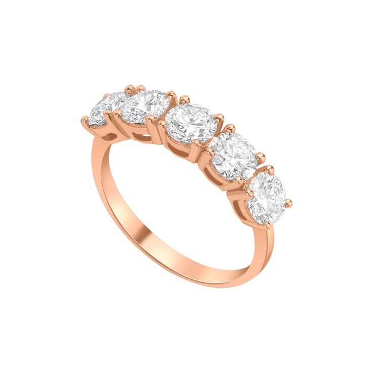 a rose gold ring with five stones on the side and four diamonds in the middle