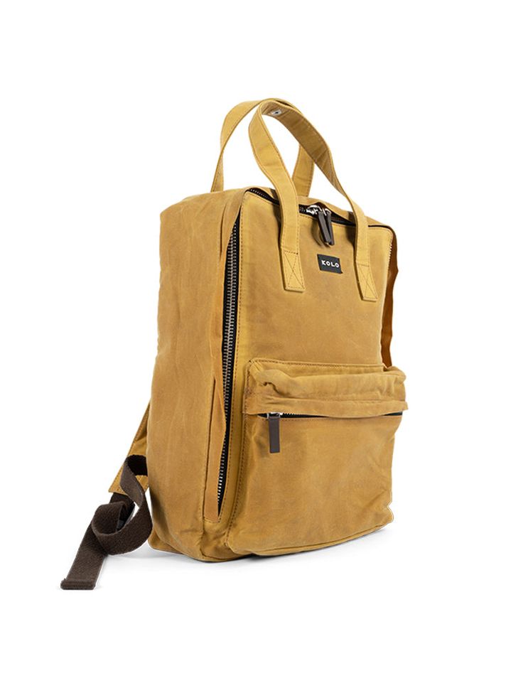 The Juno bag is double lined with two layers of organic cotton canvas. The outer layer is finished with wax, making it durable and weatherproof. Juno features a large main compartment with a laptop sleeve, a smaller front zipper pocket, and twill straps and handle. Premium solid brass hardware with a nickel matte finish is used throughout the bag. All zippers are the highest quality YKK zippers you can find. The Juno Daypack is the perfect bag for a day in the city, hiking in the woods, and ever Cotton Bag With Waxed Finish For Outdoor Activities, Cotton Backpack For Outdoor Activities, Functional Cotton Backpack For Outdoor Activities, Standard Cotton Backpack For Outdoor Activities, Everyday Rugged Standard Backpack, Rugged Everyday Backpack, Casual Adventure Backpack With Waxed Finish, Everyday Cotton Backpack With Canvas Lining, Eco-friendly Canvas Backpack For Travel