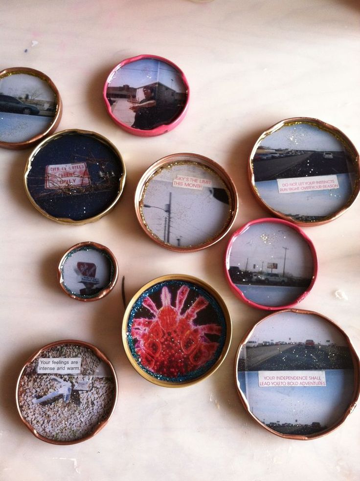 six different types of magnets with pictures in them on a table next to each other