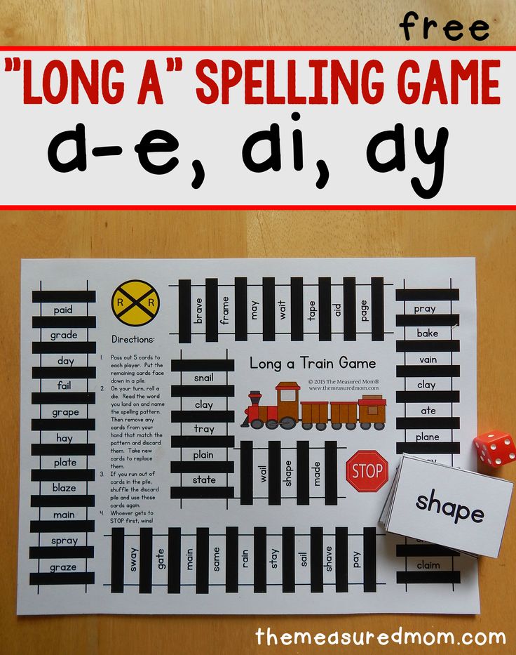 the long a spelling game is shown with dices on it and a piece of paper next to it