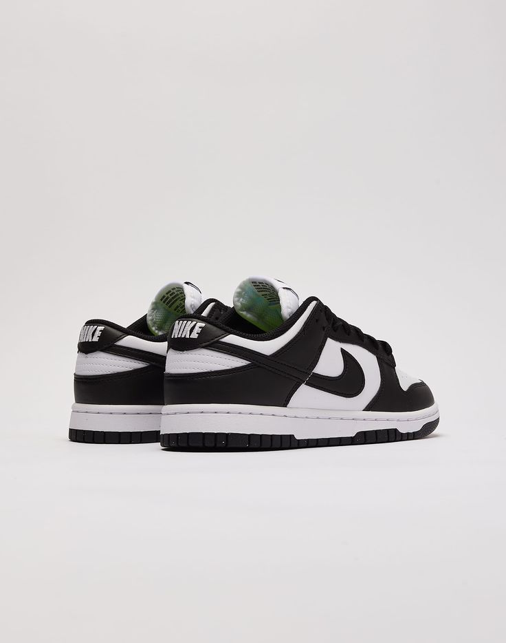 The Nike Dunk Low is the '80s basketball classic that you know and love. With clean colorblocking and durable materials, this black-and-white "Panda" colorway is a must-have in your collection. Leather upper Swoosh overlays at sides Colorblocked design Traditional lacing system Padded tongue with Nike branding Cushione Nike Dunk Low Next Nature, 80s Basketball, Nike Branding, Nike Brand, Nike Dunk Low, Dunk Low, Nike Dunk, Nike Dunks, Nike Women