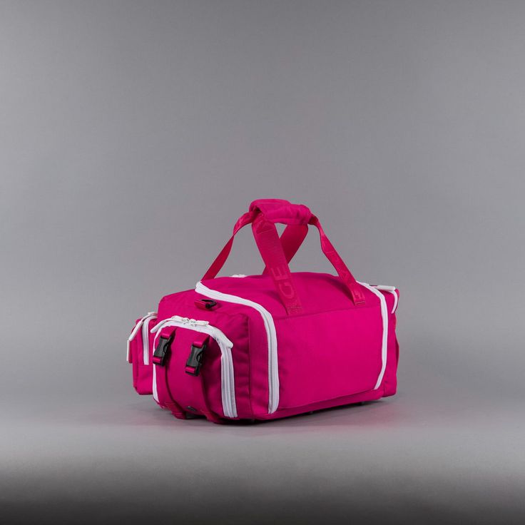 Introducing your new mini travel companions: Perfect for carrying essentials. Whether it's for a quick gym session, a day trip, or as a carry-on during travel or range bag... these bags are designed to hold just enough without being bulky or cumbersome Perfect for Adults and/or Children The 20L Mini Duffle Bag made with 1000D Oxford Waterproof Material and YKK Zippers and Clamps. This exceptional bag is meticulously designed to cater to all your needs, from jet-setting adventures to gym sessions Functional Pink Travel Bag For Outdoor Activities, Functional Pink Travel Accessories, Pink Nylon Duffle Bag For Everyday Use, Functional Pink Nylon Duffle Bag, Functional Pink Luggage, Practical Travel Bag With Luggage Sleeve For Sports, Functional Pink Luggage For Daily Use, Functional Gym Bag With Removable Pouch For Outdoor Activities, Pink Functional Travel Accessories With Luggage Sleeve