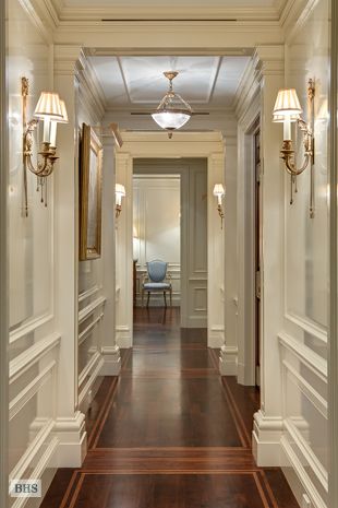 the hallway is clean and ready for us to use as an entrance way in this house