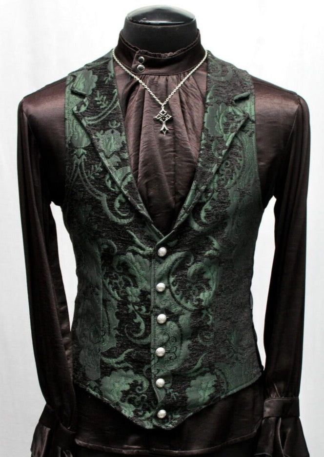 Note: These vests are very fitted. Check the size measurements below very carefully to find the size that will fit you best. A Victorian gentleman's vest with class. Great for formal occasions, can be worn under a suit jacket or by itself. Made in rich green and black tapestry fabric with black satin lining and back. This vest has a very flattering tapered fit and ties in back with satin belting so it can be made tighter in the waist. Fastens in front with six metal buttons. A notched collar add Aristocrat Vest, Masquerade Outfit, Black Tapestry, Victorian Gentleman, Green Vest, Green Suit, Tapestry Fabric, Green Outfit, Fantasy Clothing