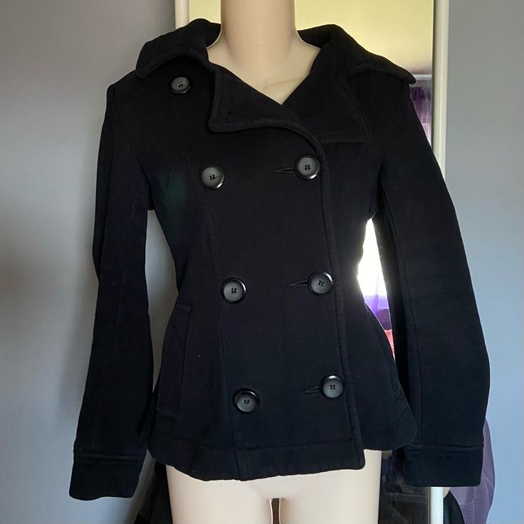 This Is A Never Worn Forever 21 Button-Up Jacket. Very Warm And It Has Two Pockets. Black Peacoat With Buttons For Work, Black Peacoat For Workwear, Black Peacoat For Work, Casual Black Peacoat With Buttons, Forever 21 Black Winter Outerwear, Trendy Fitted Pea Coat With Double Button Closure, Trendy Button-up Pea Coat With Buttons, Forever 21 Black Long Sleeve Outerwear, Black Pea Coat With Snap Buttons For Fall