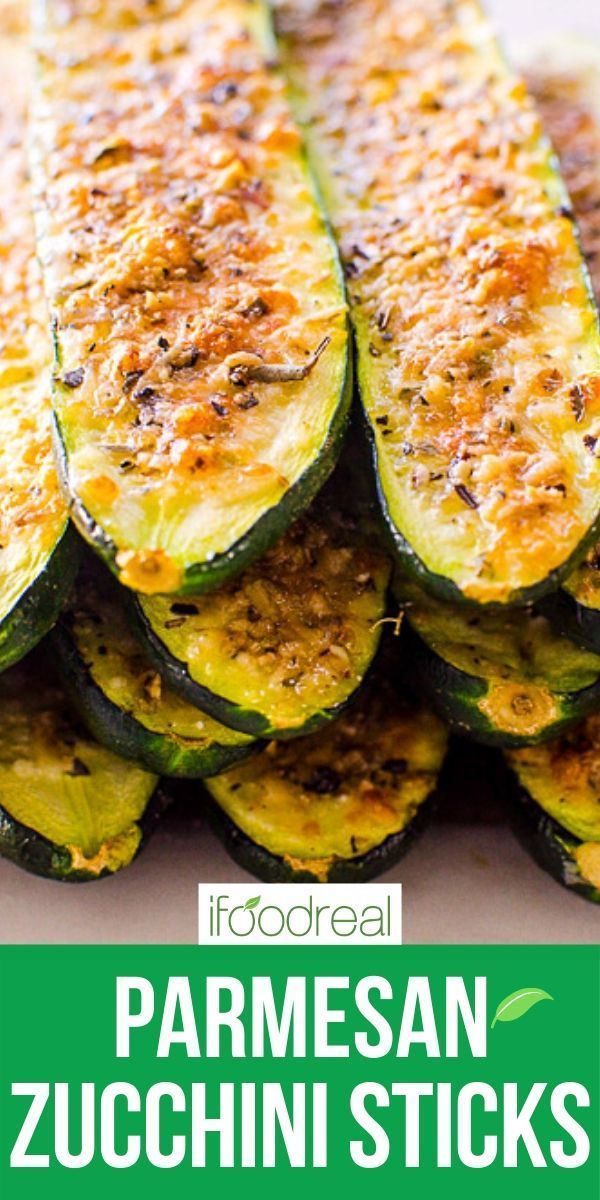 grilled zucchini sticks with parmesan and seasoning on top are the perfect side dish