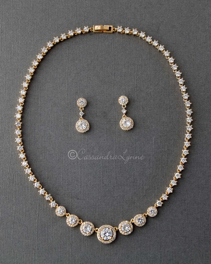 a necklace and earring set with diamonds