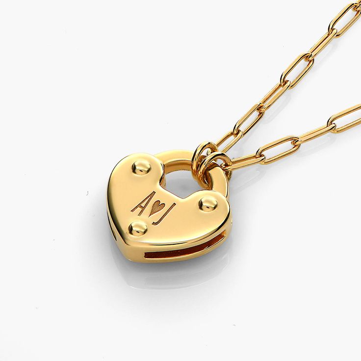 Size Guide Safety Policy Care InstructionsWear your heart on your neck with our initials heart charm Lock necklace. It features a heart-shaped Lock design that gives it a little edge. Created in gold vermeil for an alluring finish. Please note that the engraving is without ink.Gold Vermeil: Gold vermeil provides that lux look you love at a great price. This piece has a thick layer of 18K gold (up to 5 times more than regular plating) over 925 sterling silver.Customize Me! Personalize your neckla Ivy Name, Pretty Trinkets, Safety Policy, Initial Heart Necklace, Engraved Compass, Valentine Jewelry, Lock Jewelry, Diamond Initial Necklace, Lock Design