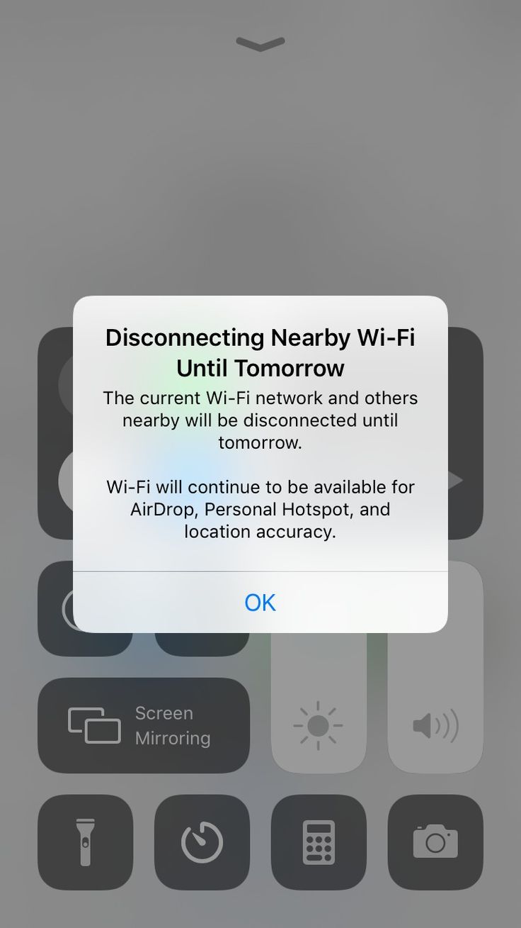 an iphone screen with the text disencting nearby wi - fi