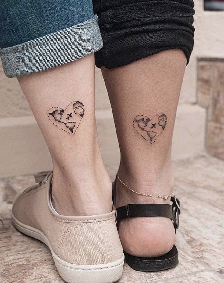 two people with matching tattoos on their legs