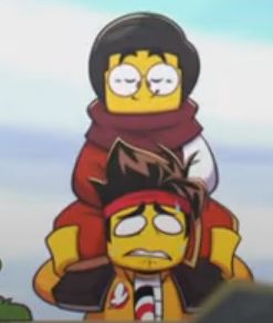 two people are sitting on top of each other in front of a cartoon character that appears to be frowning