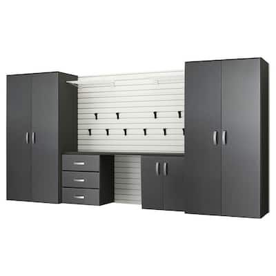 an image of a garage storage unit with drawers and cabinets on the front, side by side