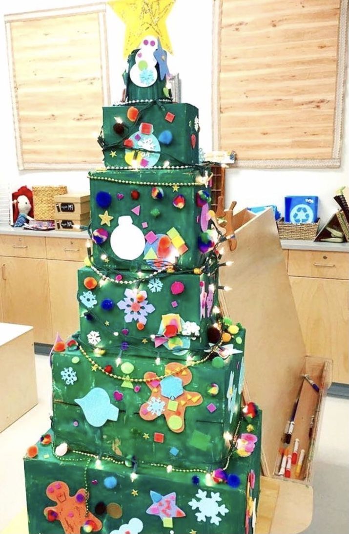 a christmas tree made out of green wrapping paper