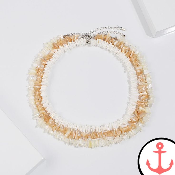 Enhance Your Nautical Style with the Puka Shell Necklace Step up your nautical jewelry game with our exquisite Puka Shell Necklace. As passionate sea lovers ourselves, we understand the allure of marine symbols and their ability to transport you to the depths of the ocean. This stunning necklace from our Shell Necklace collection is a must-have accessory for any woman who adores the sea. Features of the Puka Shell Necklace based on Existing Product Content Made from genuine puka shells, each nec