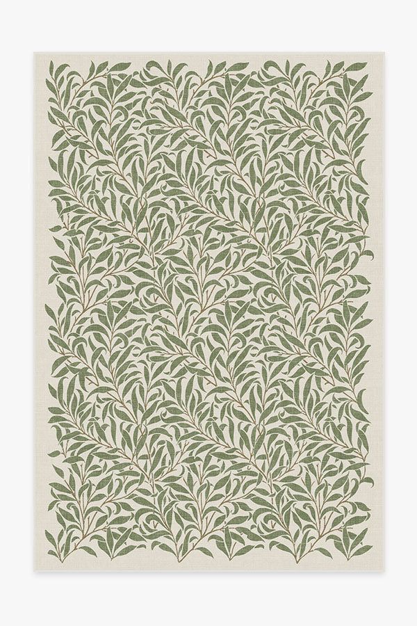 a green leafy pattern with small leaves on it