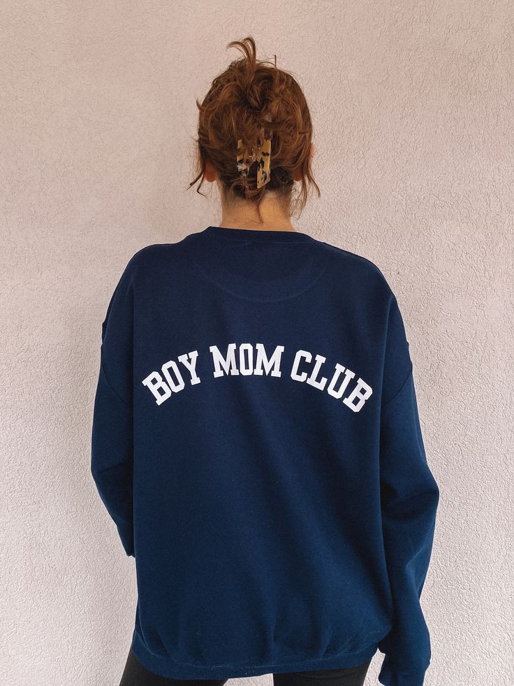 these sweatshirts are made to order just for you! please allow 5-10 business days to ship out 50% cotton, 50% poly cozy + fleece lined size up 1-2 sizes for oversized claire is 5'7", size 8/M. she is pictured wearing both size L + XL. L is a slight oversized fit, but she prefers XL for her ideal oversized, cozy fit! size L on claire: boy mom club (navy + black), girl mom club (brown), fun mom club (light blue), cool aunt club (indigo + forest green) size XL on claire: girl mom club (pink), fun m Boy Mom Aesthetic, Boy Mom Hat, Mom Cricut Shirts Boy, Boy Mama Sweatshirt, Boy Mum, Cool Aunt Club, Boy Mom Shirt Bruh, Boy Mom Sweatshirts & Hoodies, Boy Mom Shirt