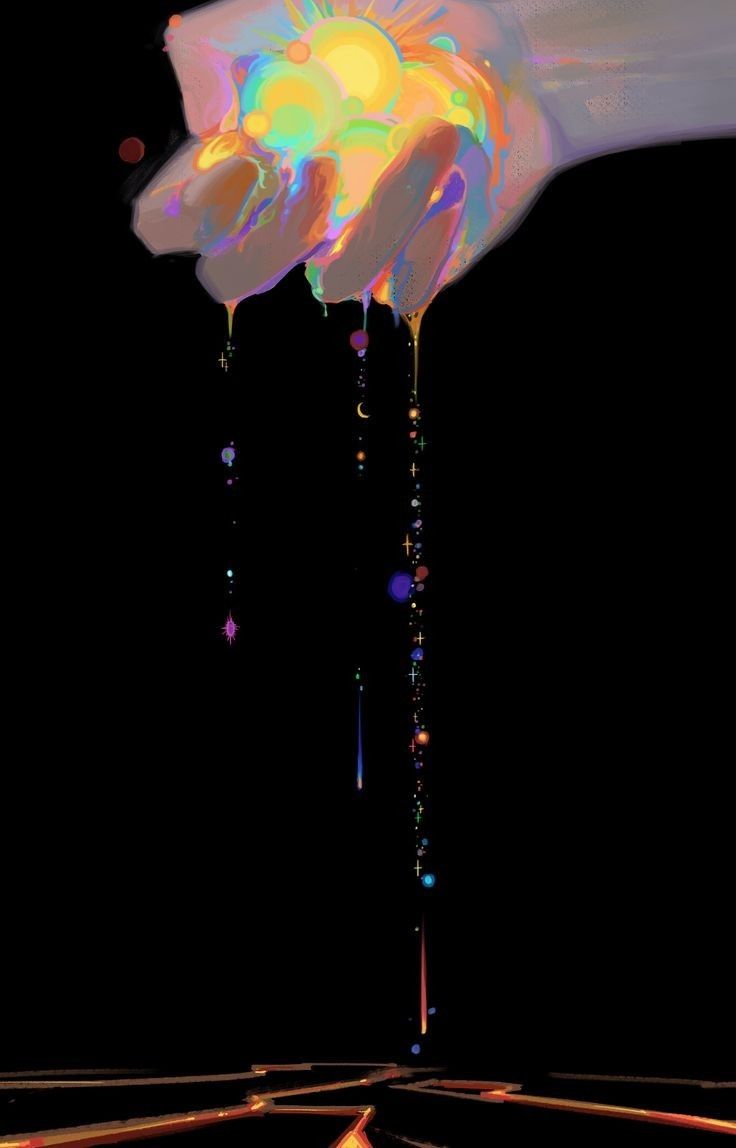 a hand is dripping water onto a black surface with bright colors on it and the image appears to be multicolored