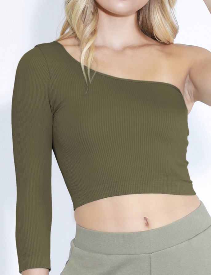 Size: One Size, fits anyone from a 32A-36DD. Description: A ribbed knit crop top featuring a V neckline. Fabric: 92% Nylon / 8% Spandex Made in USA Does not have padding, wiring or cups. We believe in highlighting the natural shape of a woman's body. Ribbed Stretch Crop Top For Fall, Ribbed Fitted Crop Top, Trendy Seamless Crop Top For Fall, Solid Ribbed Cropped Top, Fitted Ribbed Crop Top In Elastane, Fitted Ribbed Crop Top For Spring, Versatile Ribbed Crop Top, Fitted Ribbed Elastane Crop Top, Ribbed Long Sleeve Stretch Crop Top