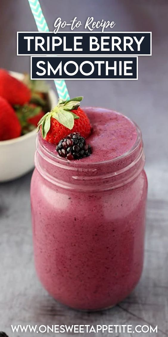 a smoothie in a mason jar with strawberries on the side and text overlay