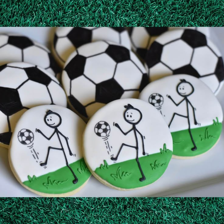 decorated cookies in the shape of soccer balls