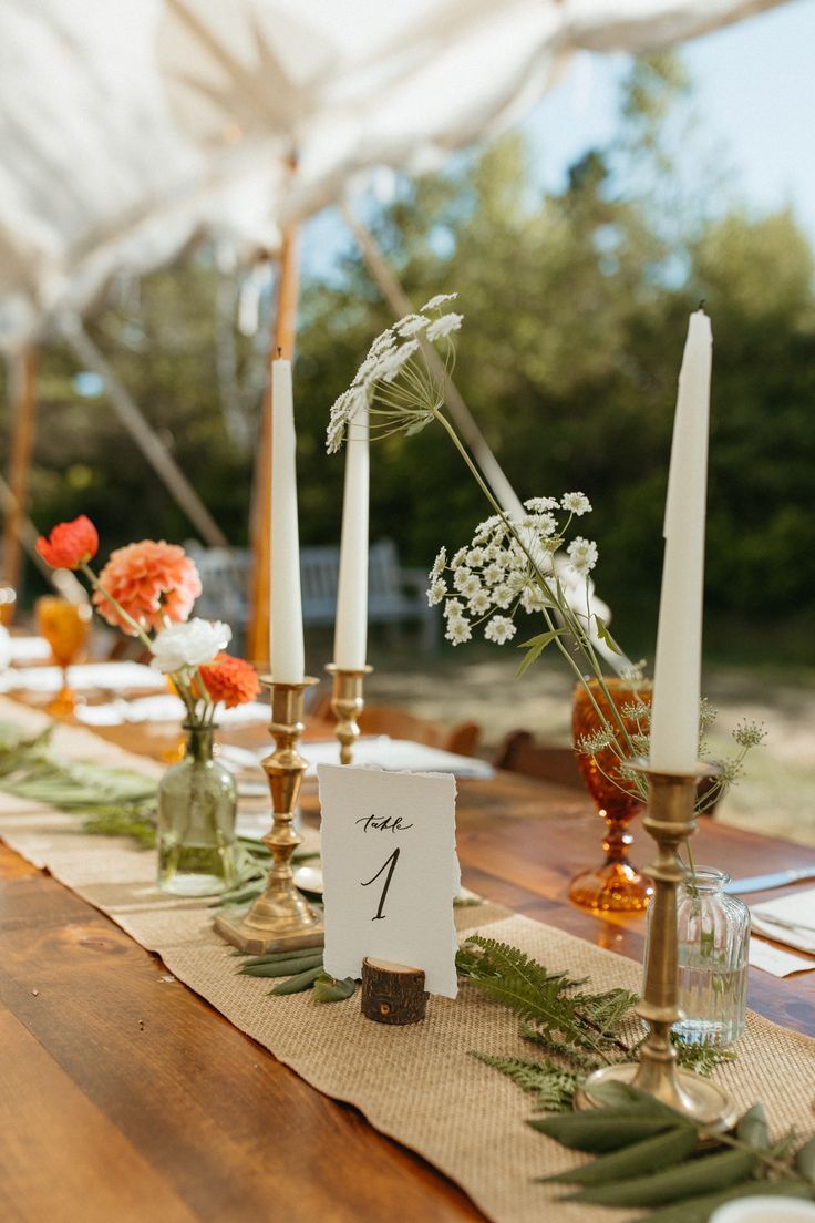 Queen Anne's Lace, Orange Dahlias, Yellow Rudbeckia, Ivory Ranunculus, and White Sweet Peas for a coastal Maine wedding right on the ocean at Newagen Seaside Inn.  Boho chic wedding with lay-flat ferns and vintage bottle collection right on Maine's stunning coastline Orange Dahlias, Ranunculus White, Dahlias Wedding, Coastal Maine, Yellow Wildflowers, Queen Anne's Lace, Sweet Peas, Vintage Bottles, Wildflower Wedding